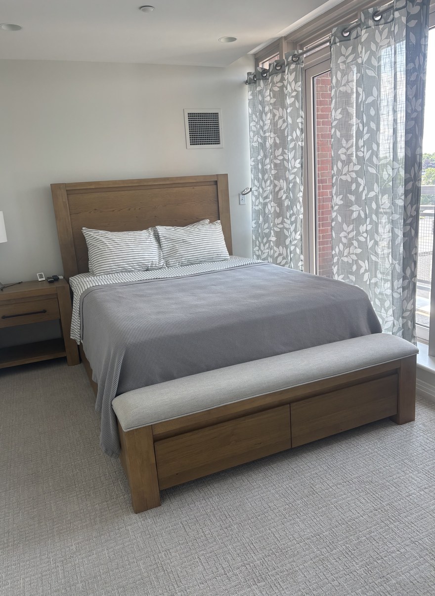 Spotless, freshly cleaned white bedroom in a Metro Boston home by Allegry Cleaning Services